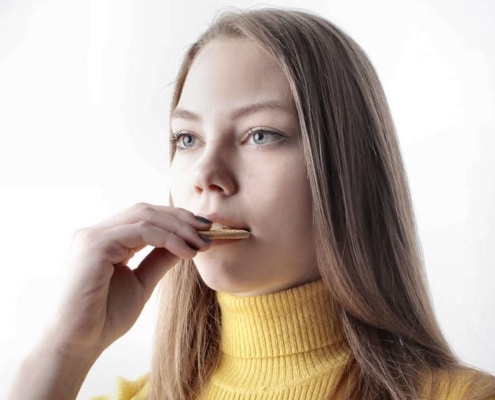 Woman eating a cookie