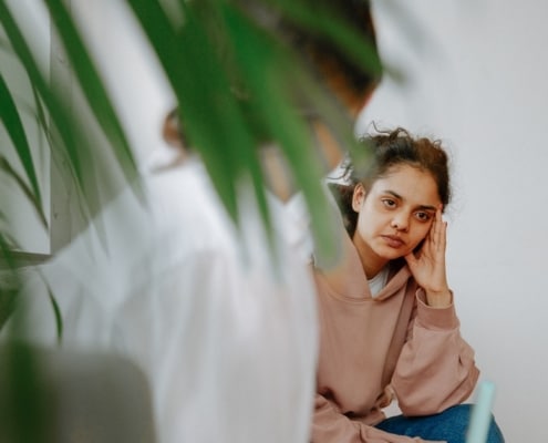 A woman talking to her doctor