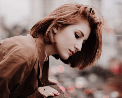 Woman looking over ledge